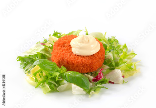 Photo: Fried cheese or fish with green salad Fried cheese or fish with green salad