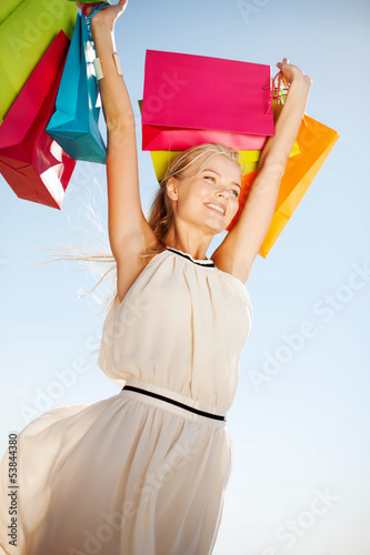 Photo: woman with shopping bags woman with shopping bags