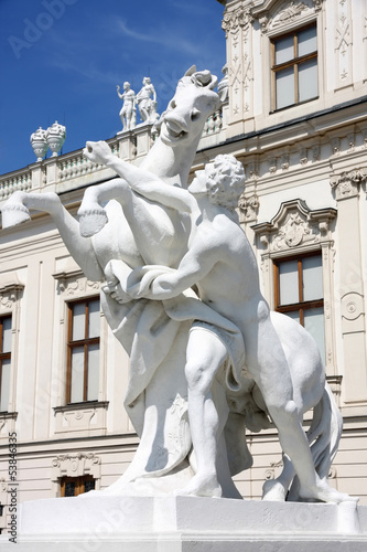Photo: Statue at the Baroque castle Belvedere in Vienna, Austria Statue at the Baroque castle Belvedere in Vienna, Austria