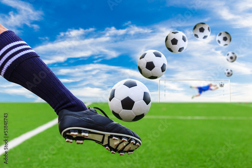 Photo: foot kicking soccer ball foot kicking soccer ball
