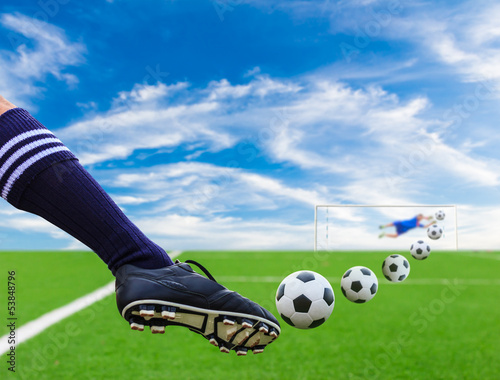Photo: foot kicking soccer ball foot kicking soccer ball