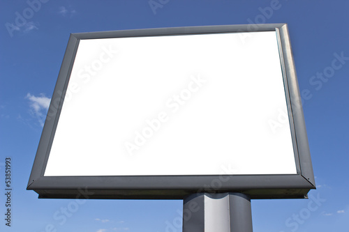 Photo: Blank billboard against blue sky Blank billboard against blue sky