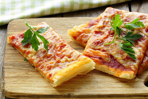 Photo: pizza of puff pastry with tomato sauce and parsley pizza of puff pastry with tomato sauce and parsley