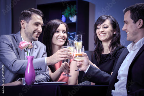 Photo: friends in a restaurant friends in a restaurant