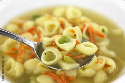 Photo: Spoonful of soup with pasta chicken broth base Spoonful of soup with pasta chicken broth base