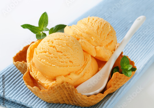 Photo: Orange sherbet in a waffle basket Orange sherbet in a waffle basket