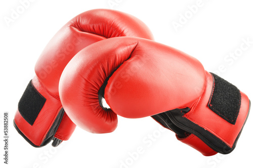 Photo: Pair of red leather boxing gloves isolated on white Pair of red leather boxing gloves isolated on white