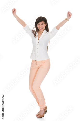 Photo: Portrait Of Woman With Arm Raised Portrait Of Woman With Arm Raised