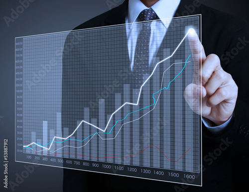 Photo: financial symbols coming from hand financial symbols coming from hand