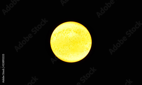 Photo: Grande stella gialla come il sole, su fondo nero Grande stella gialla come il sole, su fondo nero