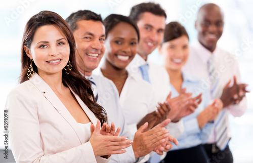 Photo: Successful business team applauding Successful business team applauding