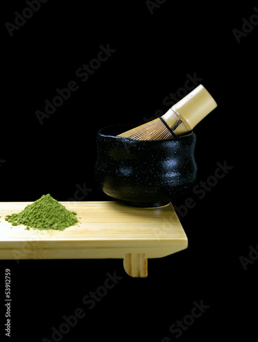 Photo: Green matcha tea with cup Green matcha tea with cup
