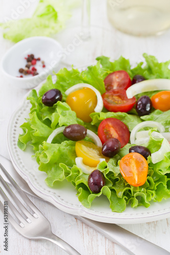 Photo: salad on white plate salad on white plate