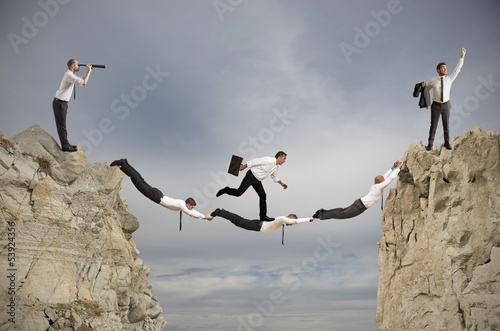 Photo: Teamwork and success concept Teamwork and success concept