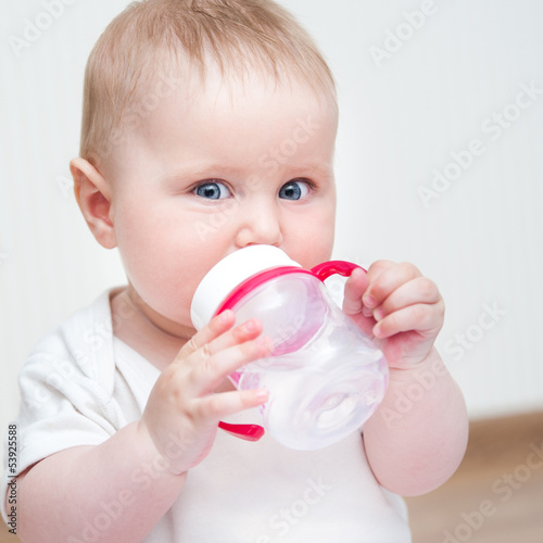 Photo: little boy with the bottle little boy with the bottle