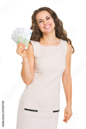 Photo: Happy young woman showing euros Happy young woman showing euros
