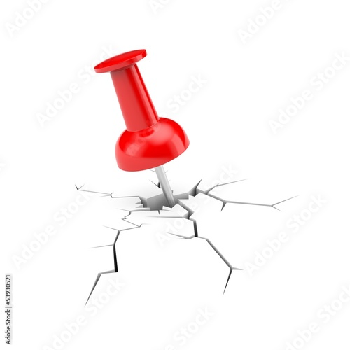Photo: Red push pin with cracked ground Red push pin with cracked ground