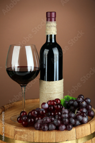 Photo: Composition of wine bottle, glass of red wine, grape Composition of wine bottle, glass of red wine, grape