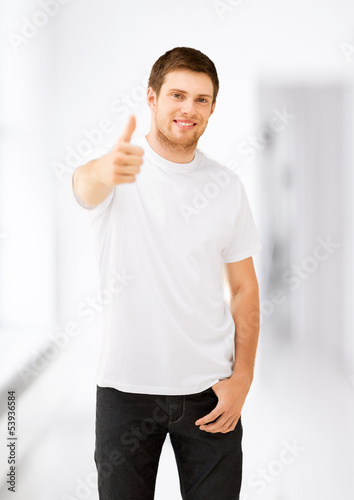 Photo: man showing thumbs up man showing thumbs up
