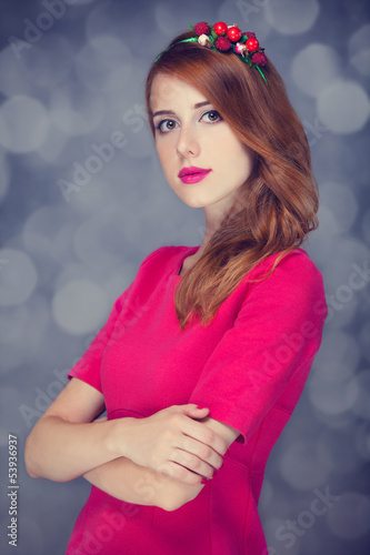 Photo: Redhead women with berries Redhead women with berries