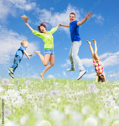 Photo: family jump in the summer family jump in the summer