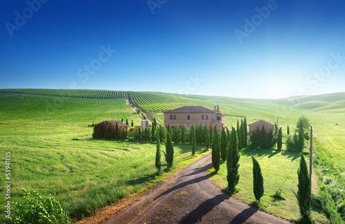 Photo: Tuscany landscape with typical farm house, Italty Tuscany landscape with typical farm house, Italty