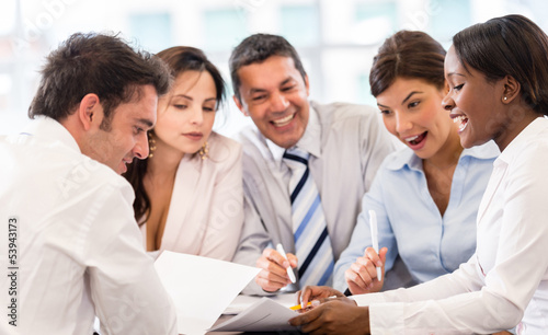 Photo: Business group working together Business group working together