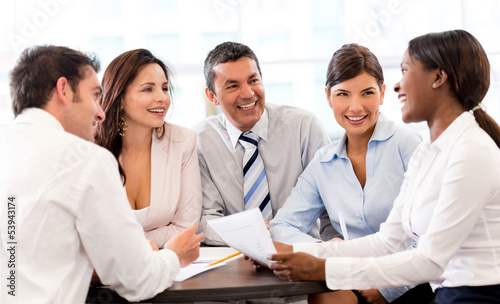 Photo: Happy people in a business meeting Happy people in a business meeting