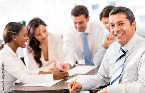 Photo: Business man in a meeting Business man in a meeting