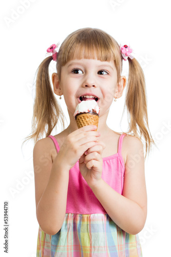 Photo: little girl eating ice cream in studio isolated little girl eating ice cream in studio isolated