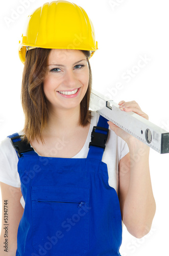 Photo: heimwerkerin mit wasserwaage heimwerkerin mit wasserwaage