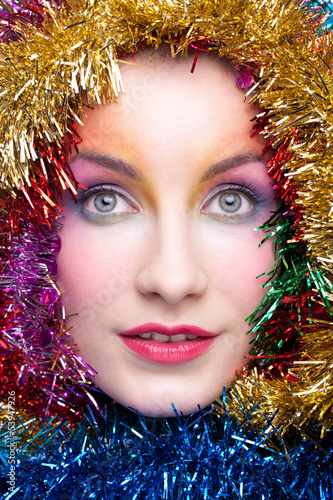 Photo: Woman in tinsel Christmas costume Woman in tinsel Christmas costume