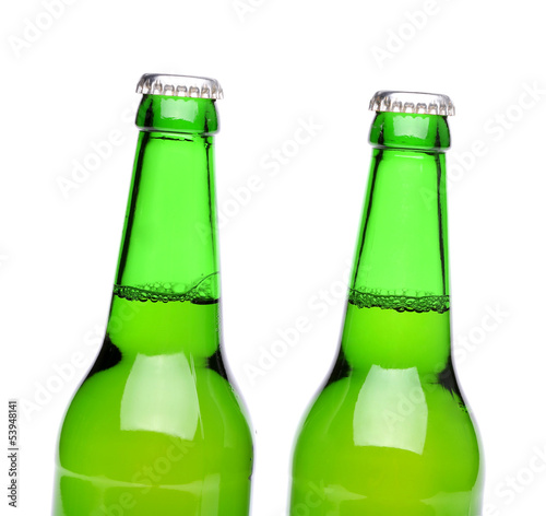 Photo: Two bottles of light ale on white background. Two bottles of light ale on white background.