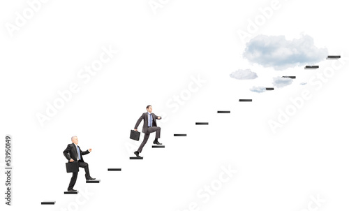 Photo: Businesspeople with briefcases headings towards the heights Businesspeople with briefcases headings towards the heights