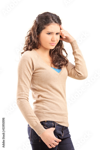 Photo: Unhappy female teenager posing Unhappy female teenager posing