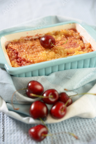 Photo: Überbackener Milchreis mit Kirschen Überbackener Milchreis mit Kirschen