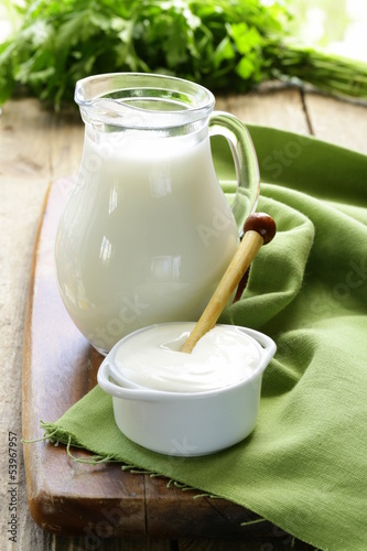 Photo: still life of dairy products (milk, sour cream) still life of dairy products (milk, sour cream)
