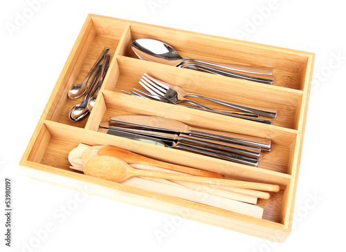 Photo: Wooden cutlery box with checked cutlery isolated on white Wooden cutlery box with checked cutlery isolated on white