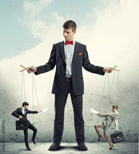 Photo: Businessman puppeteer Businessman puppeteer