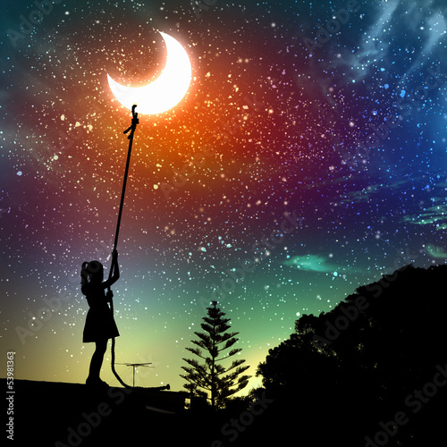 Photo: Little girl pulling moon Little girl pulling moon