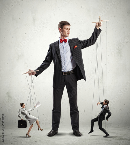 Photo: Businessman puppeteer Businessman puppeteer