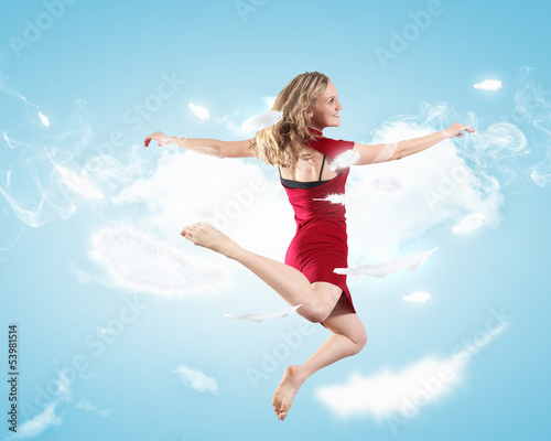 Photo: Young girl floating Young girl floating