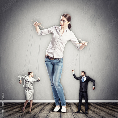 Photo: Businesswoman puppeteer Businesswoman puppeteer