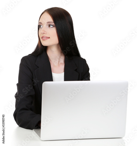 Photo: Young business woman working with computer, isolated on white Young business woman working with computer, isolated on white
