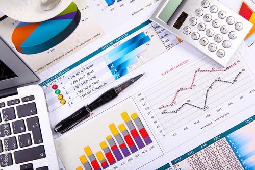 Photo: Financial papers on the table Financial papers on the table