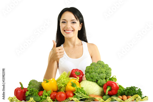 Photo: Girl with vegetables isolated on white Girl with vegetables isolated on white