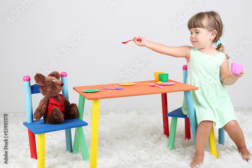 Photo: Little cute girl sitting Little cute girl sitting