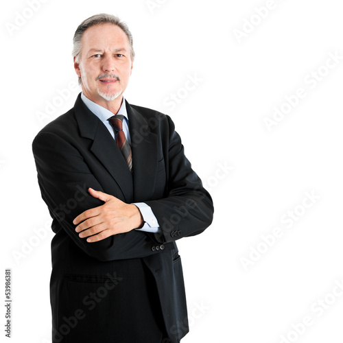 Photo: Smiling mature businessman isolated on white Smiling mature businessman isolated on white