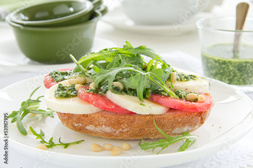 Photo: Ciabatta with tomato, mozzarella and rocket salad Ciabatta with tomato, mozzarella and rocket salad