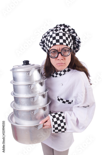 Photo: Cook with stack of pots on white Cook with stack of pots on white